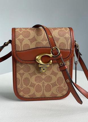 Сумка coach tall studio phone crossbody bag