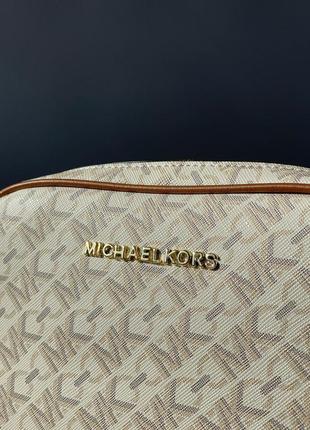 Жіноча сумка крос боді michael kors молочного кольору, бежева в натуральній шкірі + текстиль на два відділення на блискавці корс9 фото