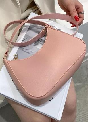 Компактна рожева сумочка1 фото