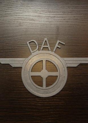 Эмблема daf с рессорами