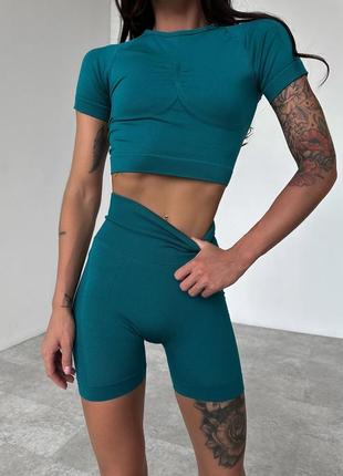Одежда для йоги и фитнеса женский спортивный бесшовный пушап костюм с шортами и топом изумрудный2 фото