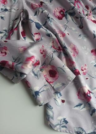 Красива блузка з довгим рукавом з тканини з блиском8 фото