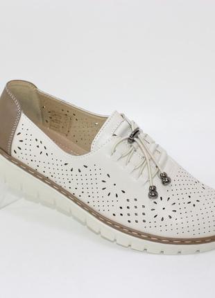 Женские бежевые летние перфорированные туфли с эластичной шнуровкой на фиксаторе,женская летняя обувь кожа1 фото