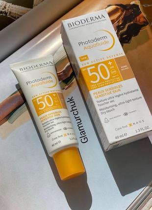 Солнцезащитная тональная эмульсия bioderma photoderm aquafluide golden spf 50+ для чувствительной кожи лица, 40 мл1 фото