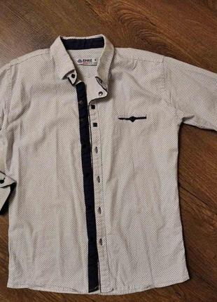 Рубашки, рубашки на парня 140-146р.2 фото