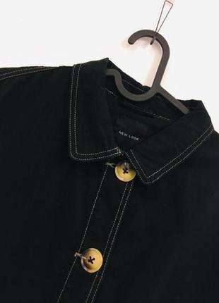 Черная практичная куртка new look с контрастной строчкой хл2 фото