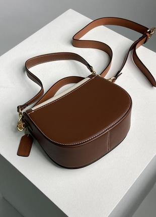 Жіноча сумка в стилі coach morgan saddle bag premium.10 фото