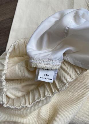 Стильні молочні джинси палаццо з високою талією6 фото