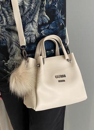 Бежевая сумочка guess1 фото