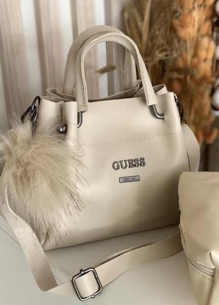 Бежева сумочка guess10 фото