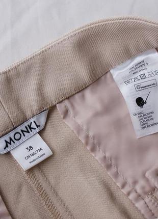 Базовые брендовые бежевые брюки от monki2 фото