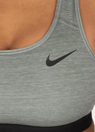 Спортивний топ жіночий nike df swsh band nonpded bra (bv3900-084)р.l3 фото