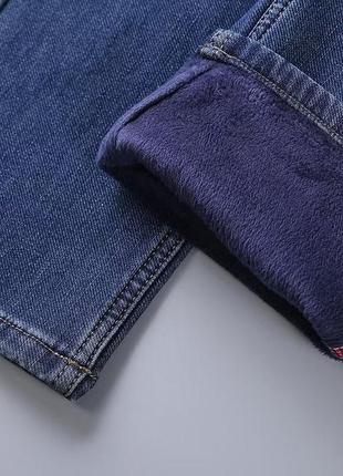 Утеплені зимові чоловічі джинси на флісі 32,33,34,36,386 фото