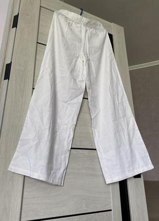 Отличные коттоновые брюки с широкой штаниской3 фото