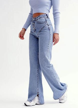 Блакитні джинси з оригінальним дизайном верху5 фото