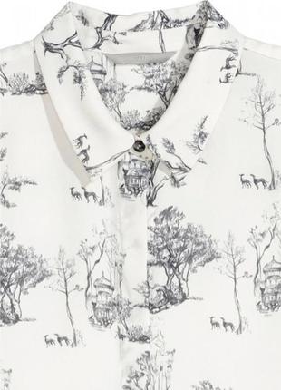 Белая блузка с принтом3 фото