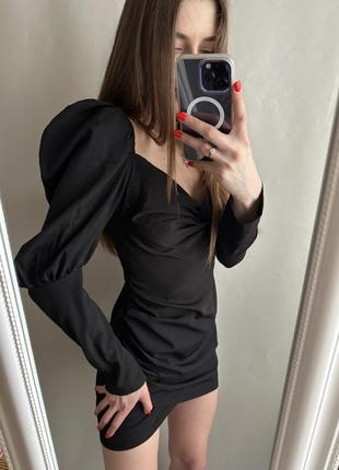 Неймовічна чорна міні сукня