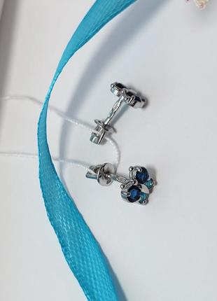 Серебряные сережки гвоздики  бабочки с голубыми камнями серебро 925 пробы родированное 82566сs 1.49г2 фото