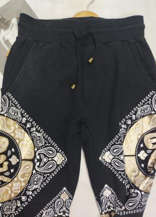 Штаны с карманами черный этничным узором золото белый спортивные на завязках