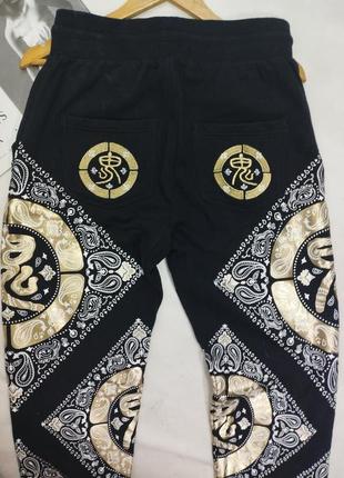 Штаны с карманами черный этничным узором золото белый спортивные на завязках