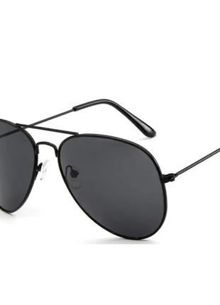 Сонцезахисні окуляри каплі з темними лінзами1 фото
