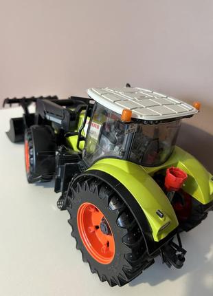 Спецтехника bruder трактор конструктор claas axion 950 с погрузчиком9 фото