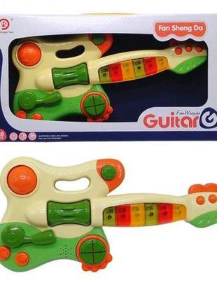Музична іграшка "гітара" на батарейках