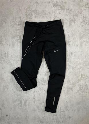 Nike running: черные лосины с рефлективными вставками для безопасных пробежек