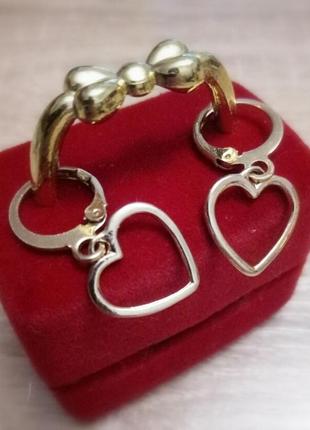 Женские серьги-кольца в форме сердца1 фото