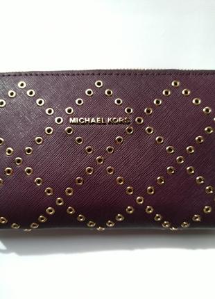 Великий шкіряний гаманець michael kors 
оригінал4 фото