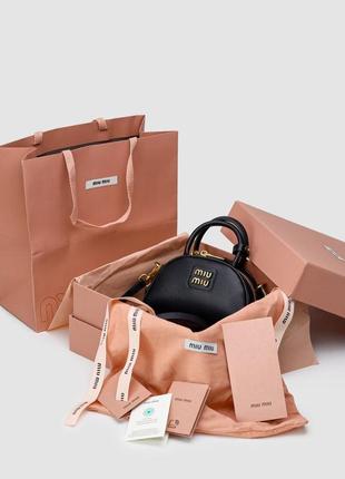 Miumiu leather top-handle bag black2 фото