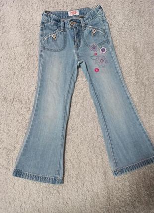 Стильные клешеные джинсы1 фото