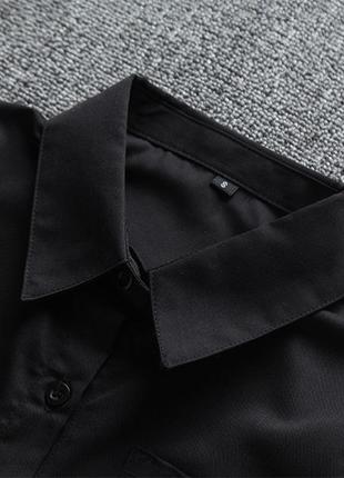 Чорна сорочка у школу мінімалістична 7301 рубашка оверсайз з карманом короткі рукави чорна форма5 фото