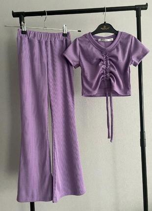 Костюм для девочки: брюки клеш + кроп-топ на затяжке