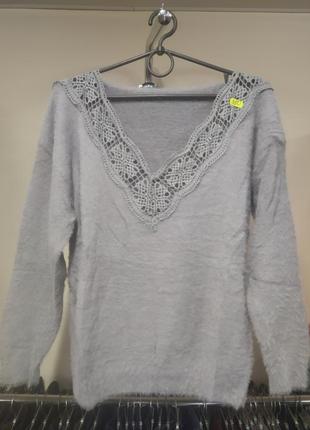 Жіночий модний светр.2 фото