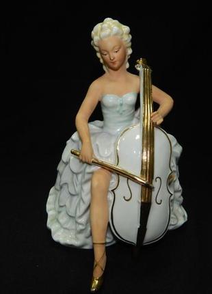 Фигурка / статуэтка "девушка с виолончелью" /  "виолончелистка". германия (гдр). мануфактура wagner & apel
