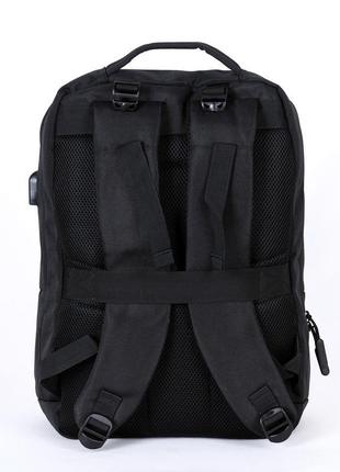 Чоловічий сучасний чорний міцний рюкзак з usb з кишенею під га...4 фото