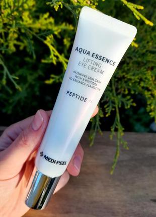 Крем для шкіри навколо очей з ефектом ліфтингу medi-peel peptide 9 aqua essence lifting eye cream1 фото