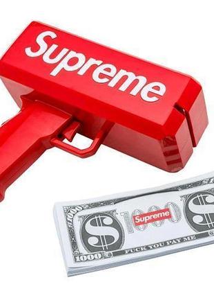 Пістолет який стріляє грошима supreme money gun4 фото