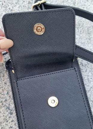 Стьобана сумочка для телефона з монетницею u. s. polo assn ори...9 фото