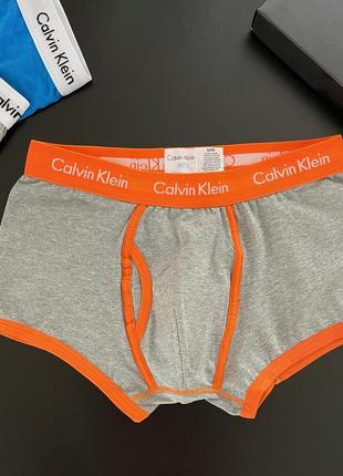 Трусы для мужчины из хлопка келвин кляйн calvin klein 365 23 цвета, серые с оранжевой резинкой fellix1 фото