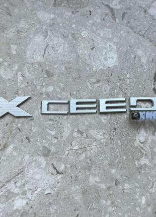 Емблема кляпи xceed 3