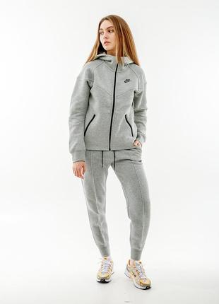 Жіноча толстовка nike multi ns tch flc wr fz hd сірий m (7dfb8338-063 m)