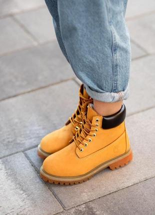 Ботинки timberland рыжие с мехом7 фото