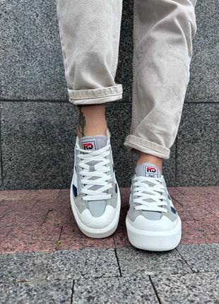 Белые очень крутые кеды - кроссовки с серыми и синими вставками7 фото