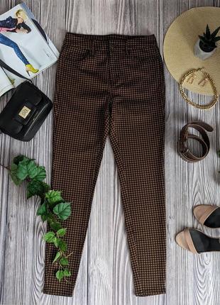 Черно-коричневые джинсы с принтом tu #550