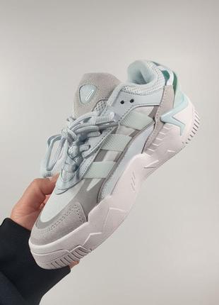 Женские кроссовки голубые с серым adidas niteball 2
•light blue7 фото