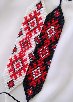 Браслеты выполнены из качественного чешского бисера в украинском стиле в двух оттенках.1 фото