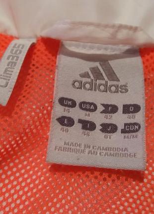 Жіноча біла спортивна куртка Preto adidas.4 фото