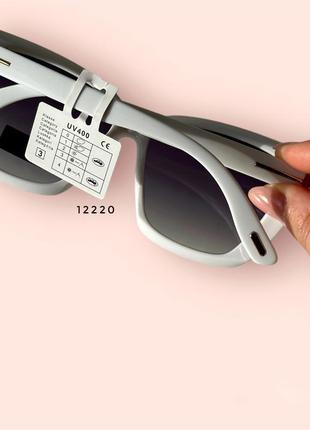 Жіночі сонцезахисні окуляри в білій оправі4 фото